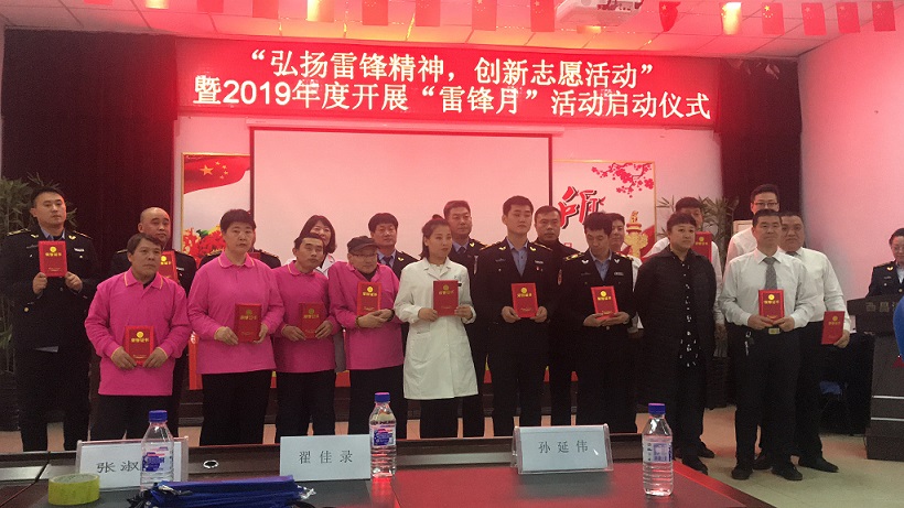 1551772764469558.jpg 图为优秀志愿者们合影.JPG