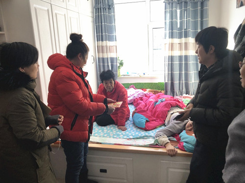 1578282301690419.jpg 会展慰问残疾人.jpg